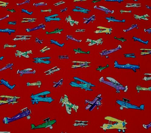 Vintage planes on a red background.